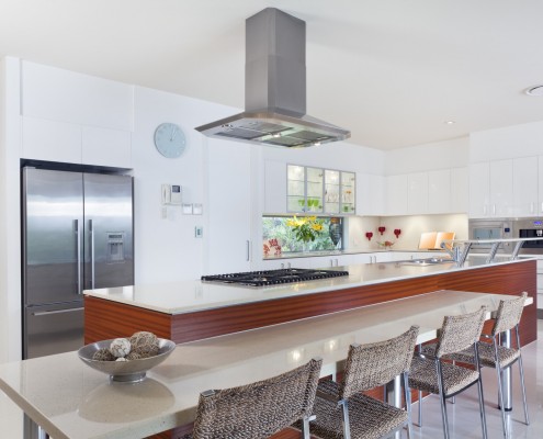 Modern kitchen with stainless steel appliances in Australian mansion